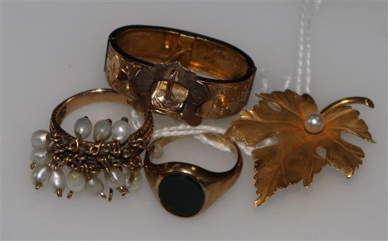 A 14ct gold and pearl ring, a signet ring with bloodstone matrix, a gold and pearl leaf brooch and a scarf clip.